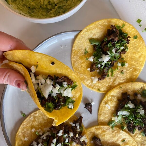 Repurposed leftover steak to a delicious carne asada street taco recipe. Great idea for how to use leftovers.