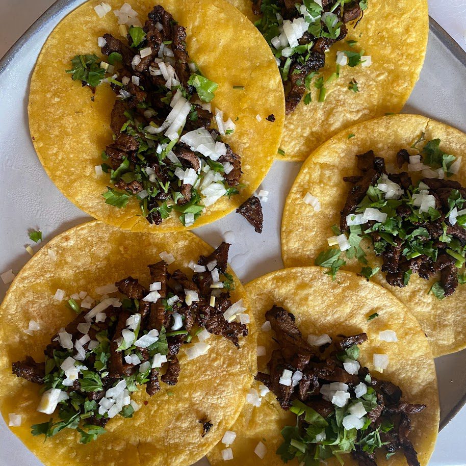 Repurposed leftover steak to a delicious carne asada street taco recipe. Great idea for how to use leftovers. 